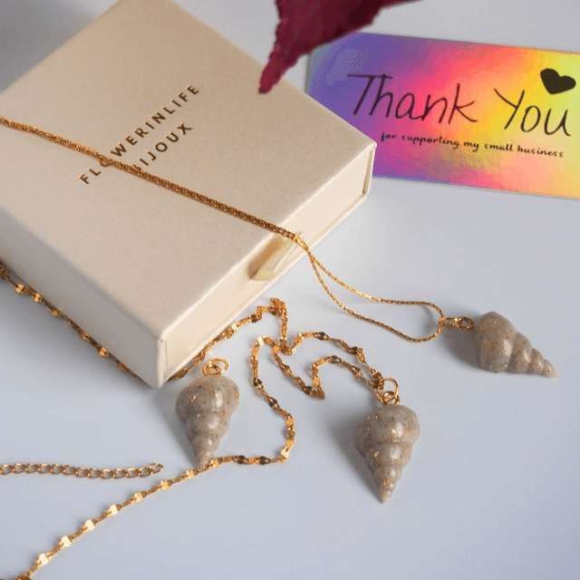 Collier coquillage escargot fait main chaîne acier inoxydable 